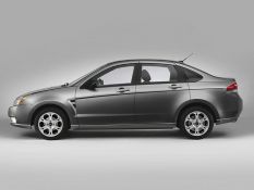 Stock image of a dark grey Ford Focus, which had QLD registration 233 ZBQ and was stolen from a home in Larapinta today.
