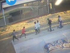 Image of youths throwing rocks