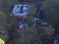 Image showing the rescue operation with waterfall in the background